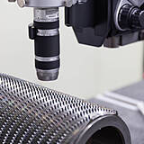 Optical inspection of a helical broaching shell