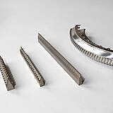 Details of a turbine disc broaching tool with workpiece (right)